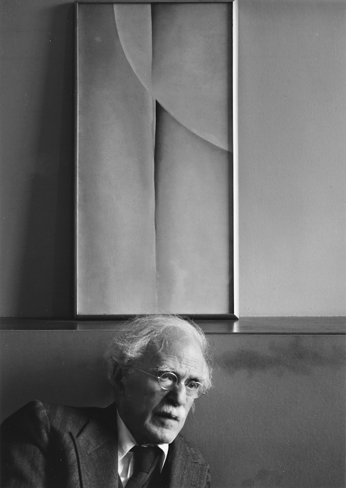 Alfred Stieglitz and a painting by Georgia O'Keeffe at An American Place, New York by Ansel Adams