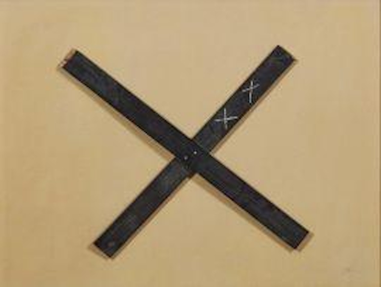 X on carton by Antoni Tapies