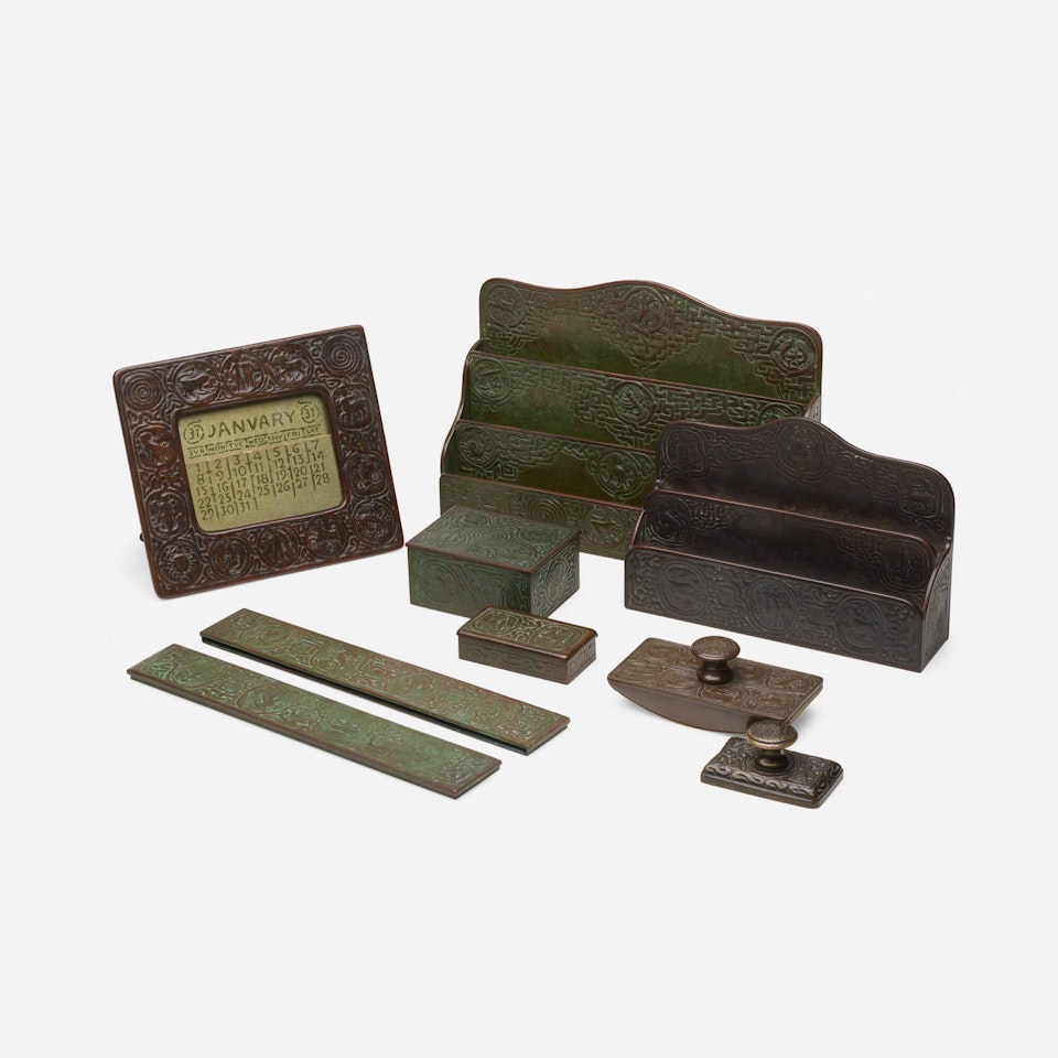 Collection of eight Zodiac desk articles by Tiffany Studios