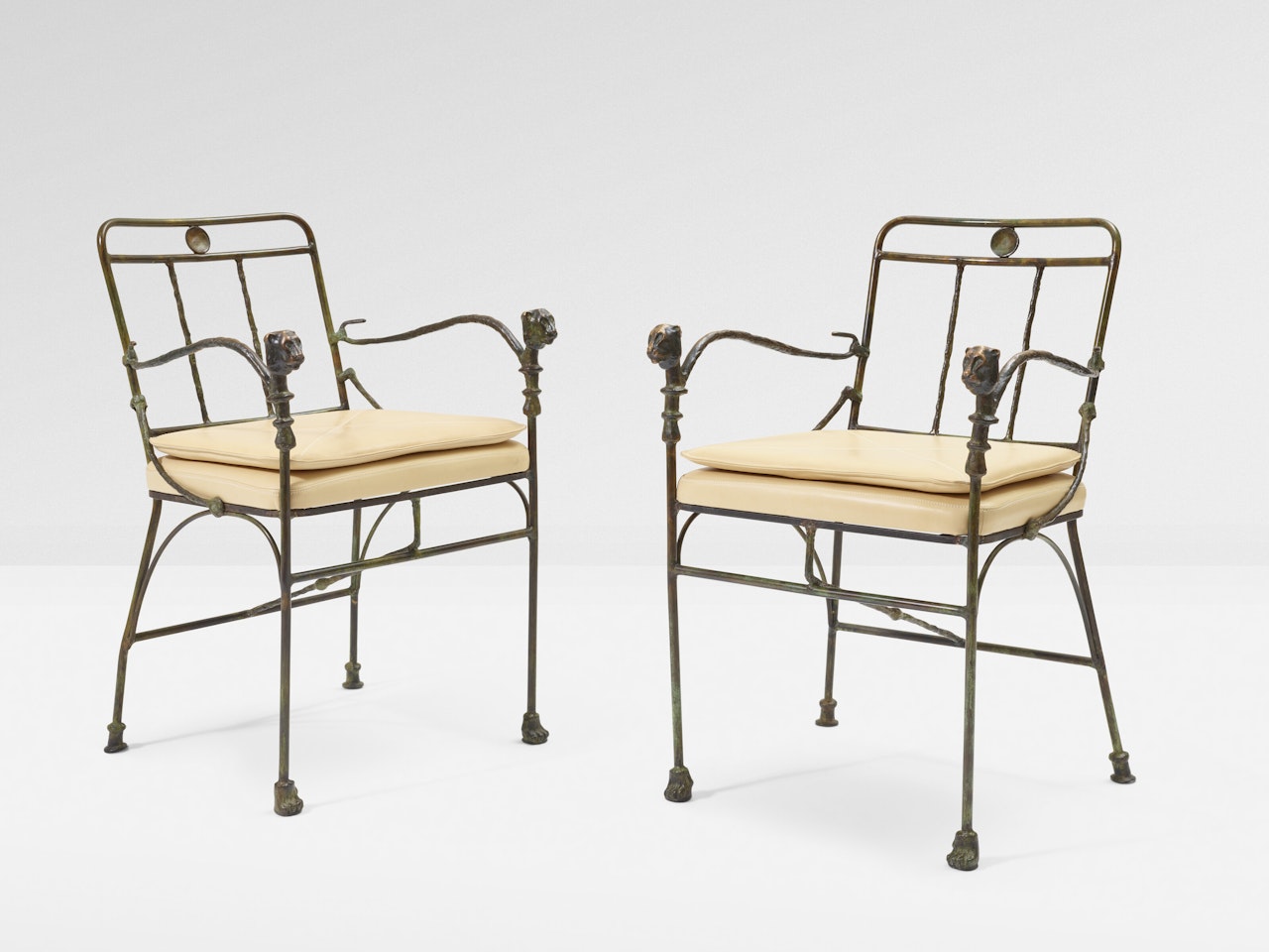 Paire de fauteuils "Têtes de Lionne" by Diego Giacometti