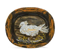 Colombe sur lit de paille