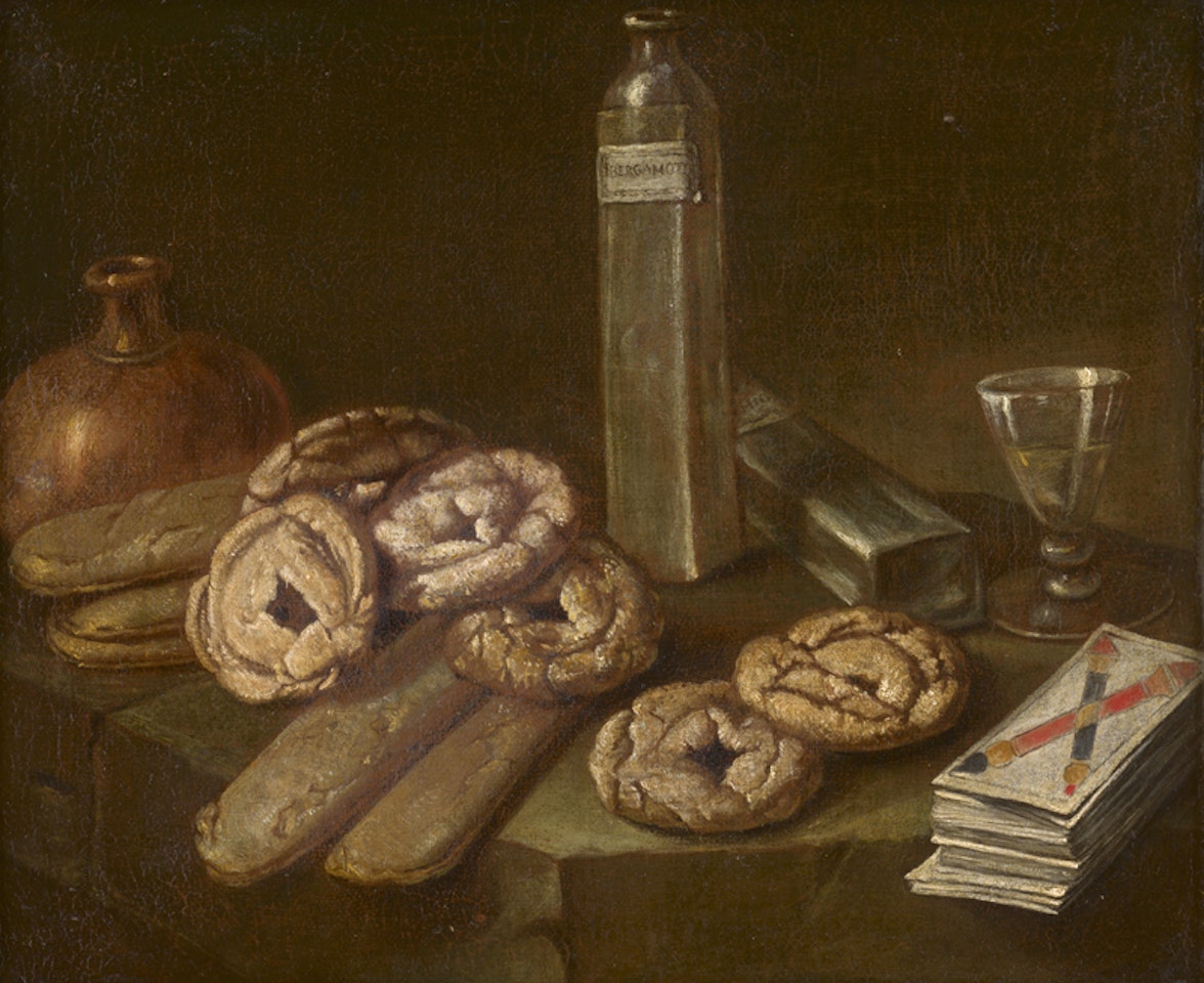 still life with confectionery, biscuits, bergamot liqueur and playing cards by BOLOGNESE SCHOOL