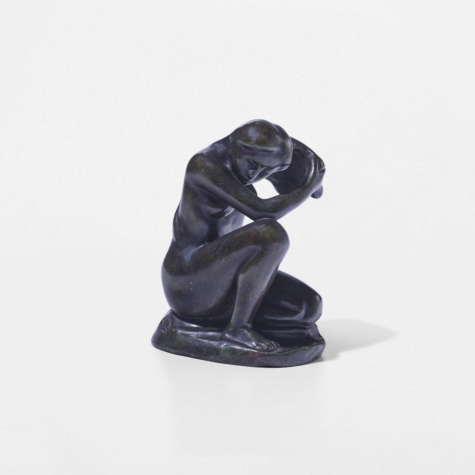 Jeune fille accroupie se coiffant by Aristide Maillol