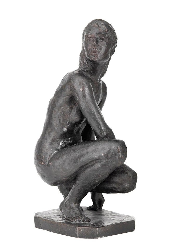 Woman sitting on a bench by Arne Durban