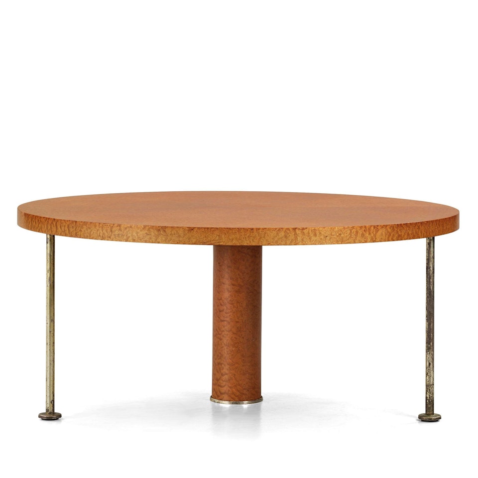 An "ospite" dining table by Ettore Sottsass