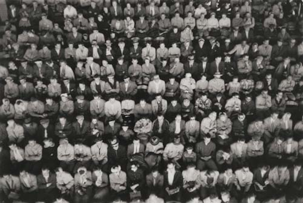 Crowd in stadium by Henri Cartier-Bresson