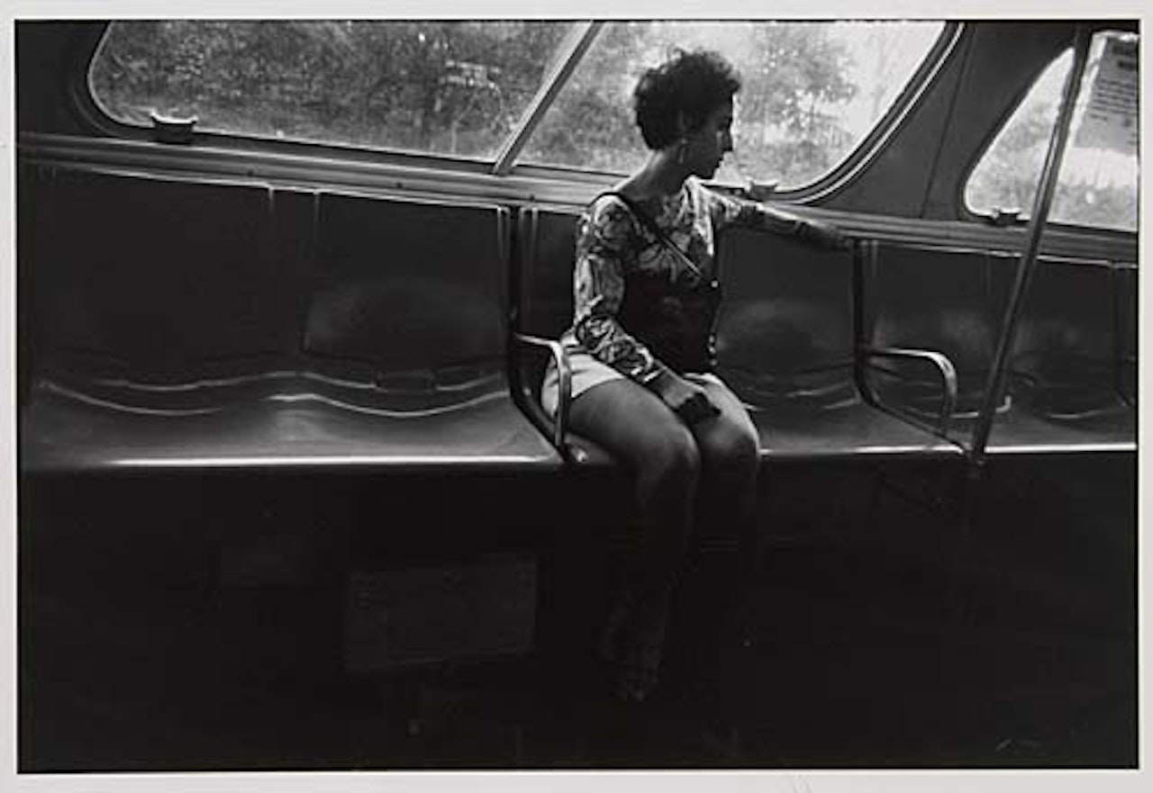 Girl on a bus. by Garry Winogrand
