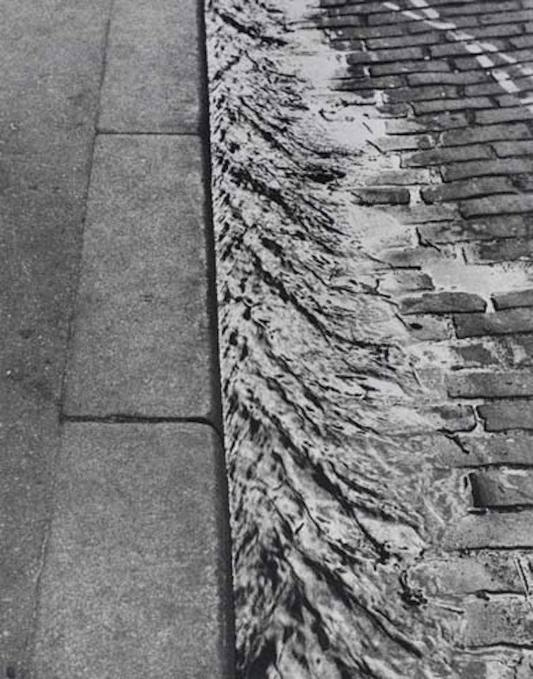 Untitled (Paris street abstraction) by André Kertész