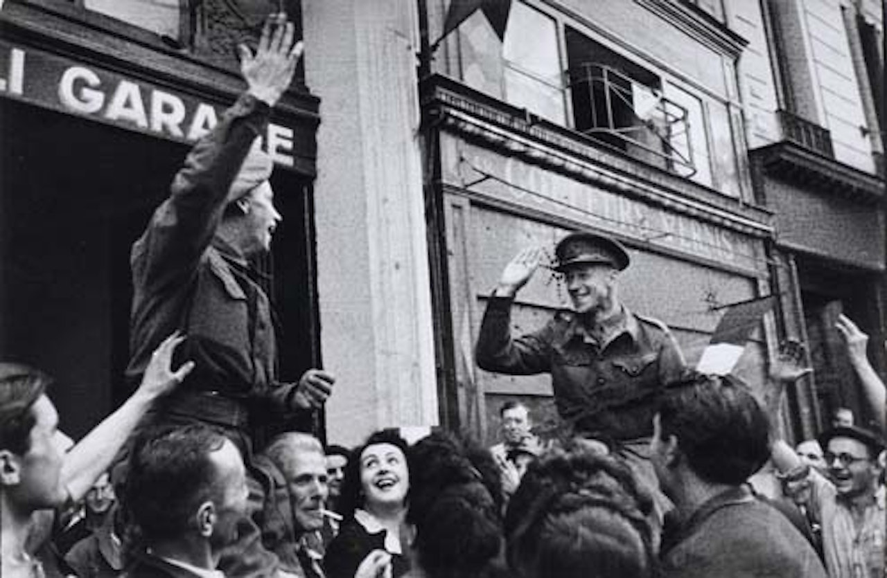 The French celebrating D-Day by Henri Cartier-Bresson