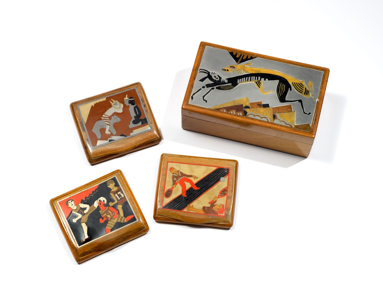 Group of Three Cigarette Cases and One Tobacco Box by Jean Dunand