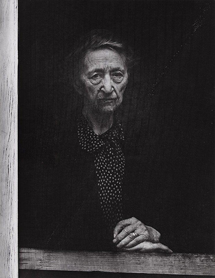 Woman Behind Screen Door, Independence, California by Ansel Adams